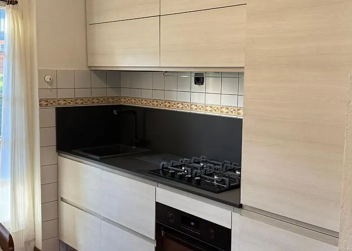 Hostdomus - La Casa Di Merlino Apartamento Oulx